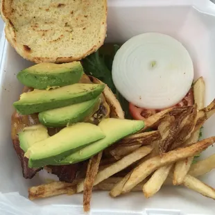 A Bacon Cheddar Avocado Burger to-go...  I appreciate all the avocado they put into it.