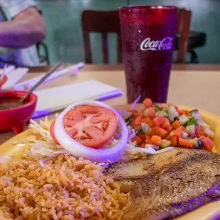 Pan grilled fish, rice, veggies and a salad.