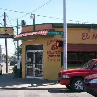 a red truck parked in front of it