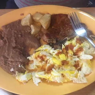 Eggs with pork chop and beans