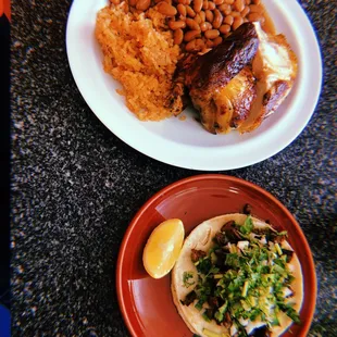 Rotisserie chicken, rice, beans and a carne asada taco