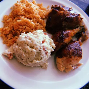 Rotisserie chicken, potato salad, and rice