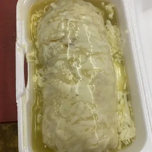 Wet burrito with green sauce