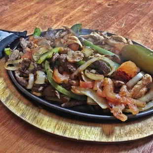 Fajita Mix (chicken &amp; Steak ) comes with rice, beans, guaca salad and tortillas