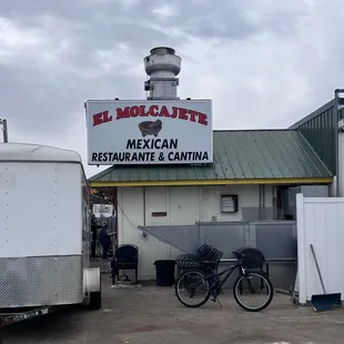 two bikes parked outside