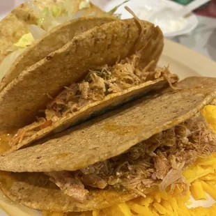 Shredded chicken hard shell tacos