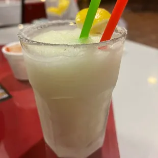 a drink with two straws in it