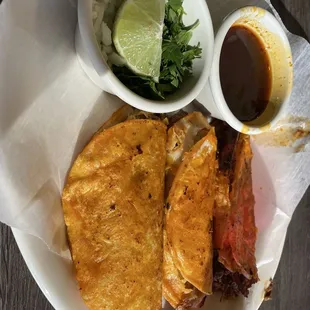 Birria tacos with the broth