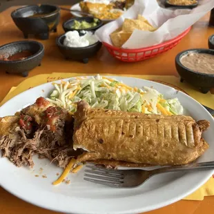 Chimichanga of Choice with works, rice and beans.