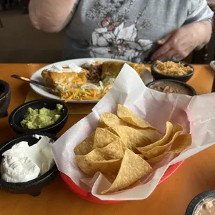 Chimichanga of Choice with works, beans and rice
