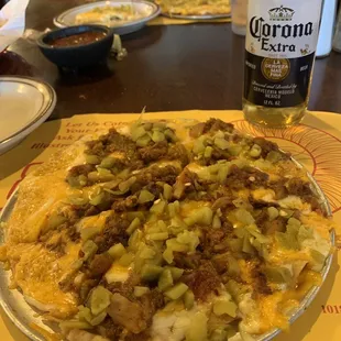 Cheese Crisp with Carne Seca and green chiles.