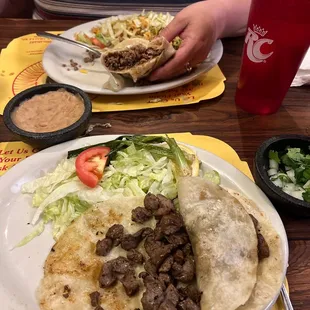 Carna Asada tacos and a beef burrito