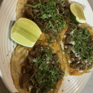 Tacos de Birria (cheese and some kind of steak)