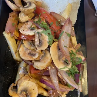 Saltado de Champinones