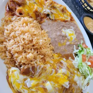 Chili relleno,  enchilada,  beans and rice.
