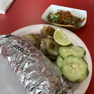 Carne asada burrito with and carne asada taco