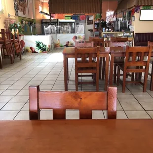 a table and chairs in a restaurant