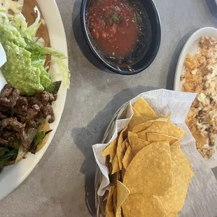 Chips, Salsa, Grilled Steak Fajita,  Arroz con Pollo