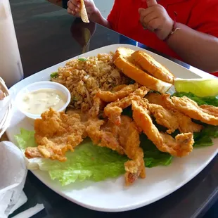 Breaded shrimp really good and the rice haves a good flavor