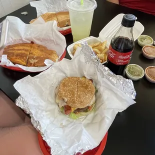 Hamburger, birria torta, torta cubana, and agua de limon