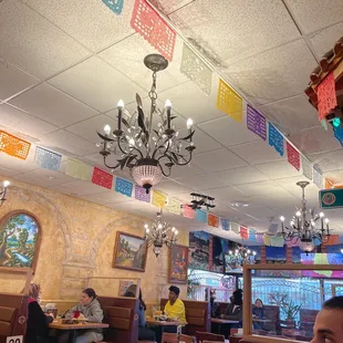 a man sitting at a table in a mexican restaurant