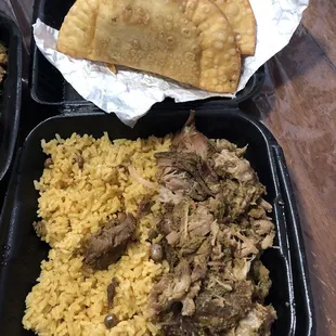 Pernil con arroz gandules and empanadas