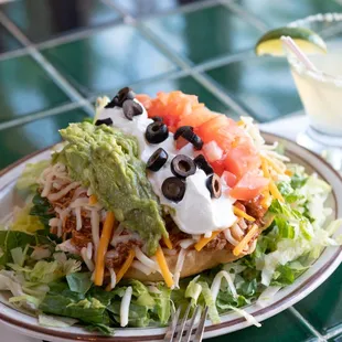 a taco salad and a margarita