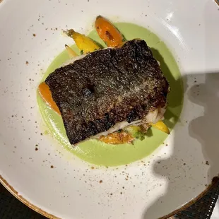 Black cod with saffron &amp; almond risotto cake, tomatillo avocado sauce and baby carrots...