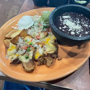 Black beans and Mexican potatoes with cheese