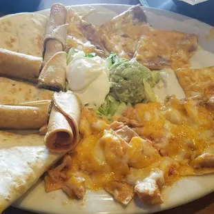 The sampler. Both the bean and chicken nachos were soggy when they arrived.