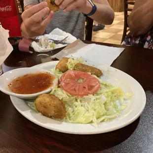 a man eating a plate of food
