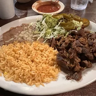 Carnitas are great the rice and beans are seasoned well.