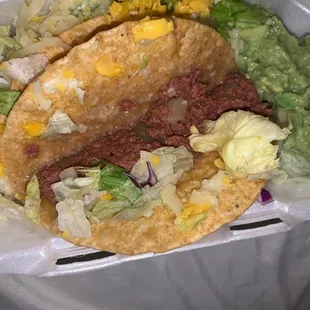 My greasy crispy tacos with ground beef....