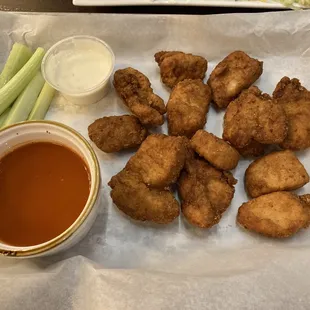 10 boneless wings with buffalo sauce on the side.