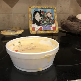 1/2 full small container queso for $8.25