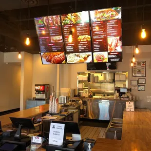 a restaurant counter and menus