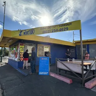 Store Front of El Nortenos - Walk up and order. Sit in or Take-out.