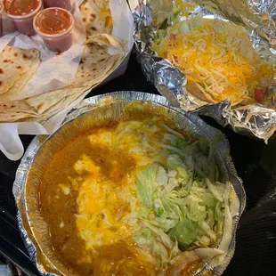 Cheese enchilada, beef taco, and a cheese quesadilla