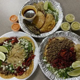 From left, clockwise: Beef &amp; Pastor street tacos, Birria tacos, Half &amp; half Gordita.