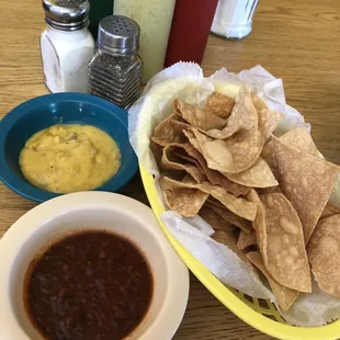 Complimentary chips, queso, and salsa