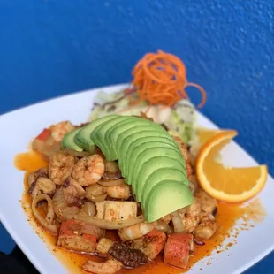 Tostada caliente Shrimp, octopus,abulon,jaiva,scallops avocado with side salad