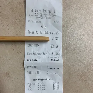 a receipt and a pencil