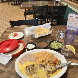 CHEESY POLLO $16.25. GUACAMOLE $6.50