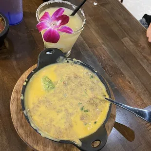 Ground beef queso with guacamole and the strong but delicious marrrrgarrrita!