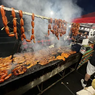 Grilling meats over mesquite coals!!