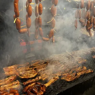 Grilling meats over mesquite coals!!