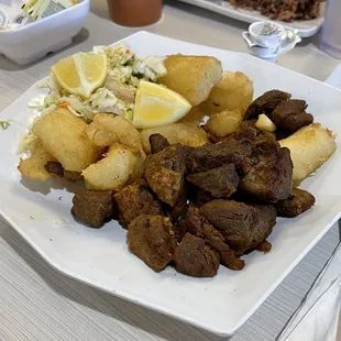 Yuca frita con chicharron. Fried yucca and pork.