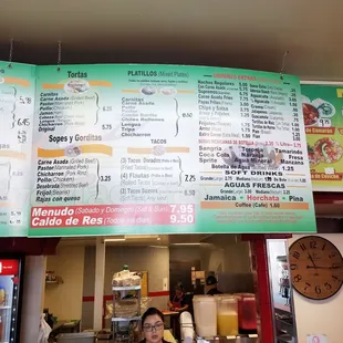 a woman behind the counter