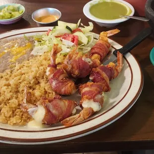 Bacon Wrapped Shrimp was very good. Rice and Beans for both of us was too salty.