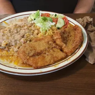 My wife's salty fish fillets. The breading was undercooked.